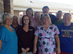 Cimarron Pointe staff pose for a photo to celebrate the success of the state survey.